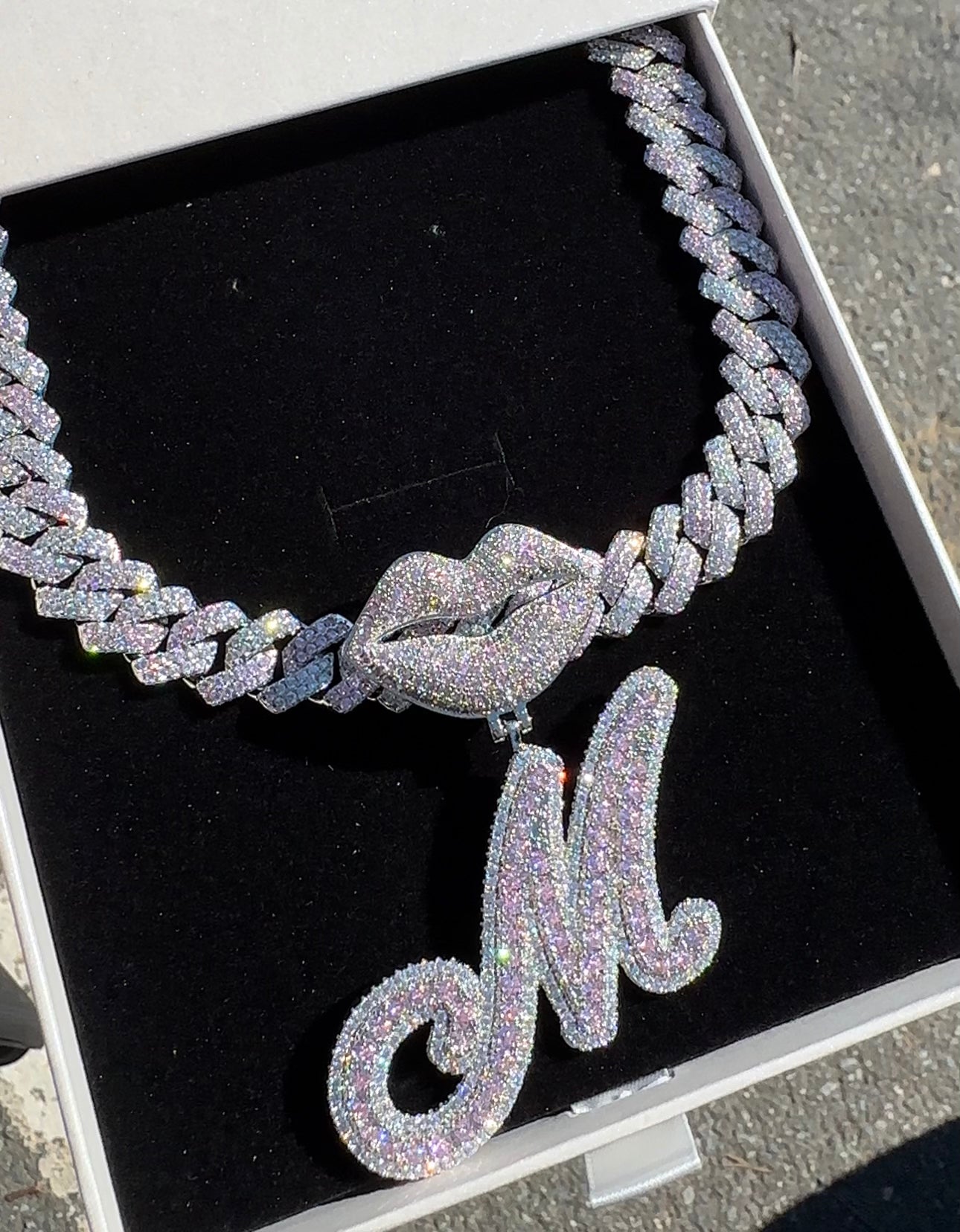 Cursive Lip Initial Necklace — custom cursive letter pendant on cotton-candy chain in pink/white, silver, or gold — CharmBox cursive initial necklace