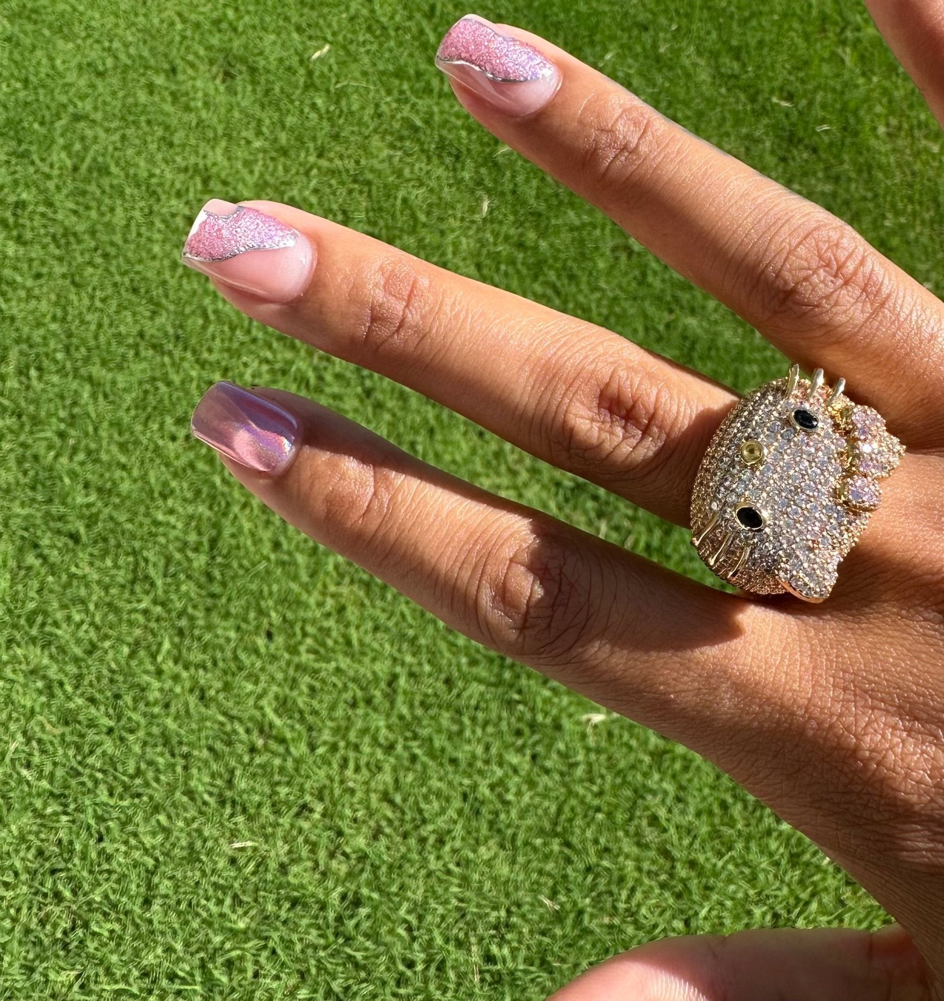 Iced out Kitty Ring – styled view