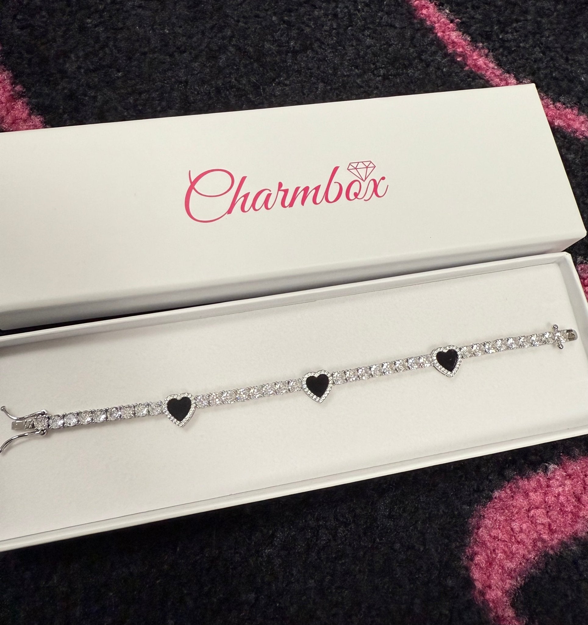 Black Hearts Tennis Bracelet — three black hearts outlined in cubic zirconia on silver-plated bracelet — CharmBox black hearts tennis bracelet