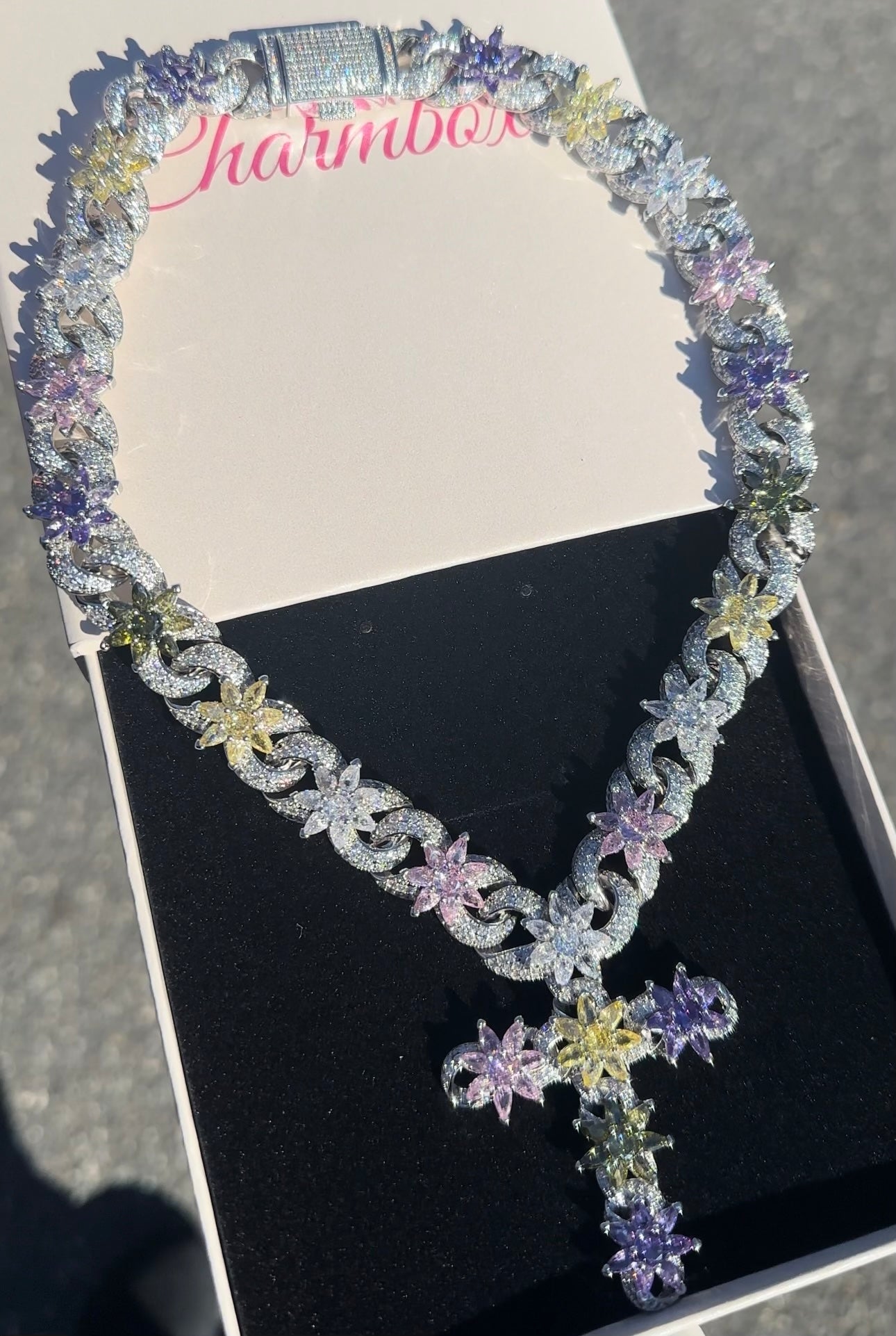 Infinity Flower Cross Necklace — silver chain with multi-color flower accents and cross detail — CharmBox infinity flower cross necklace