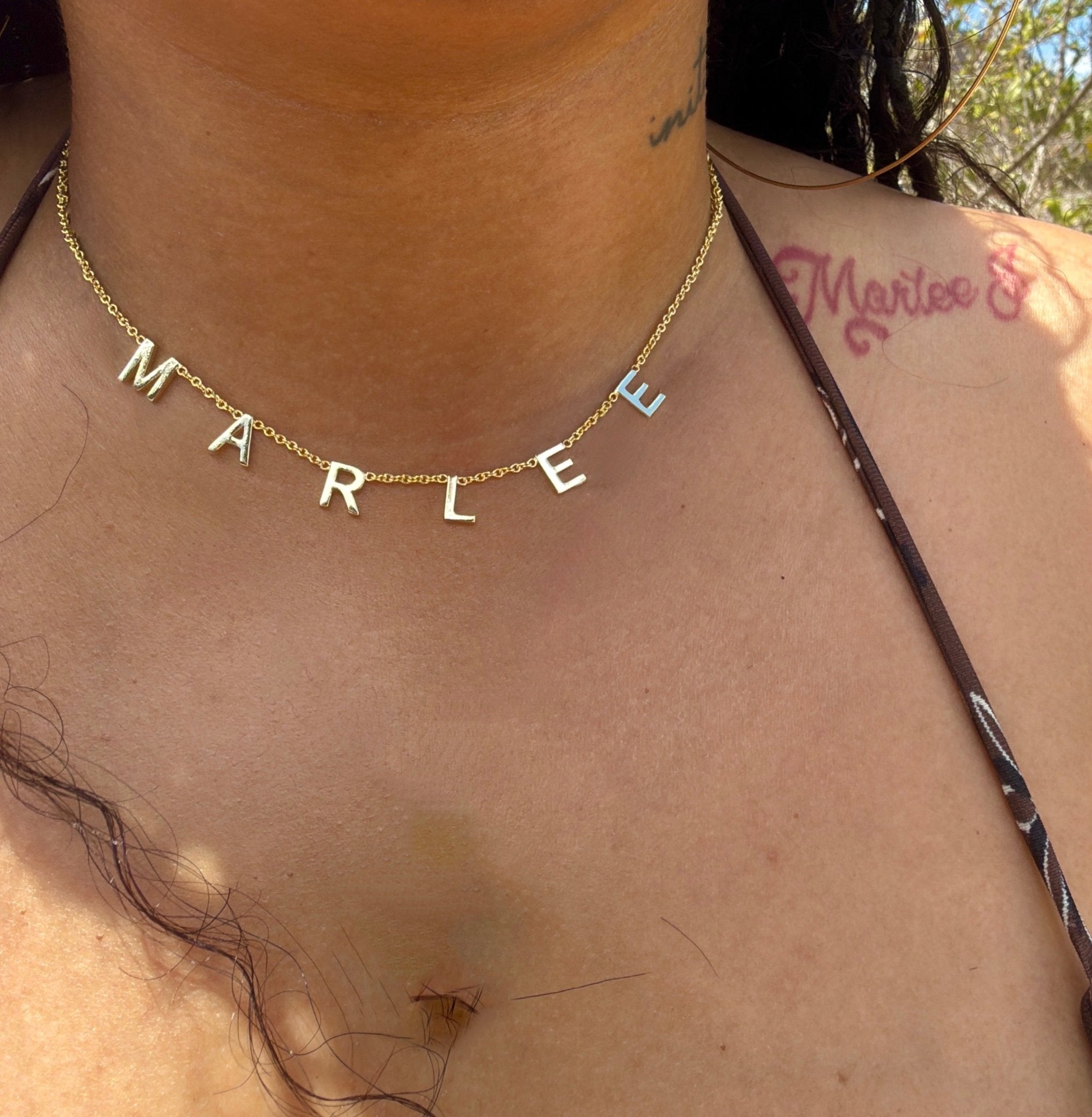 Gold floating name necklace personalized with individual letter charms on a delicate chain – CharmBox custom name necklace in gold, silver, or rose gold