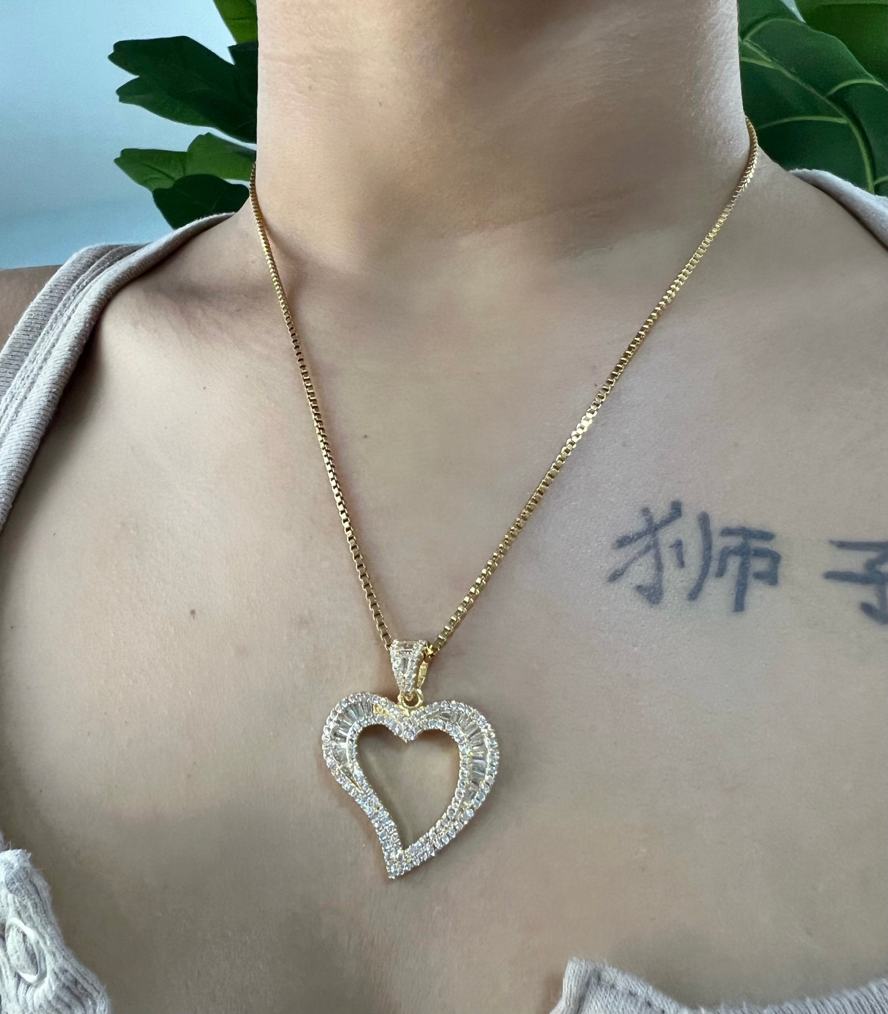 Wavy Heart Pendant — wavy heart pendant on an 18-inch box chain in silver, gold, or rose gold — CharmBox wavy heart necklace